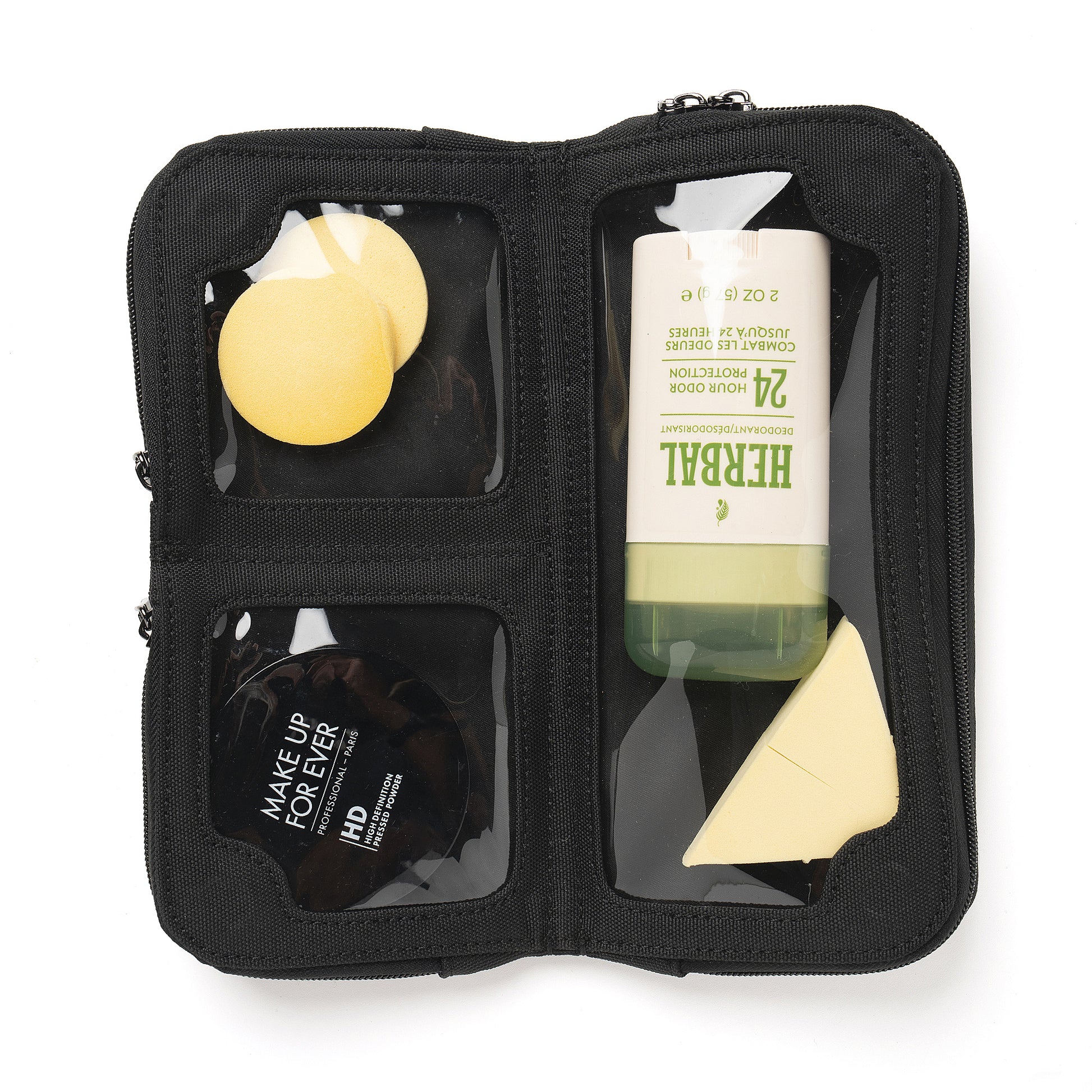 Interior view of the Eros 11"x11" nylon crossbody bag in black, showcasing its spacious design with three compartments for organized storage. The sleek black lining complements the exterior, while the sturdy construction and hidden magnets in each corner ensure the bag stays securely closed. Ideal for holding everyday essentials with ease and style.